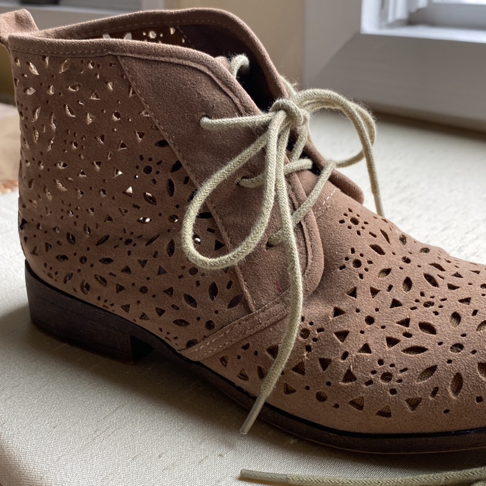 Madden Girl size 6 lazer cut booties .